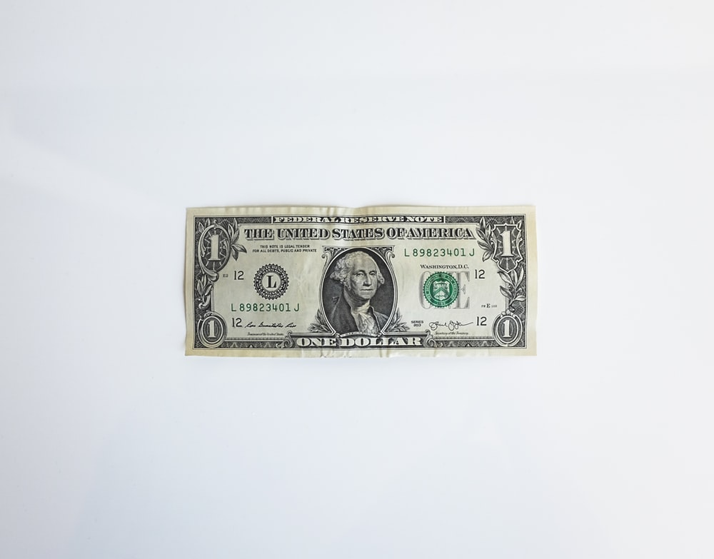 A cumpled dollar bill